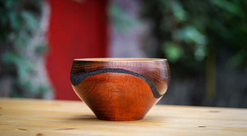 red wooden bowl